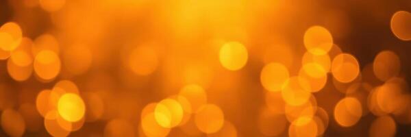 Glowing golden lights create a warm ambiance in a festive night setting with blurred background photo