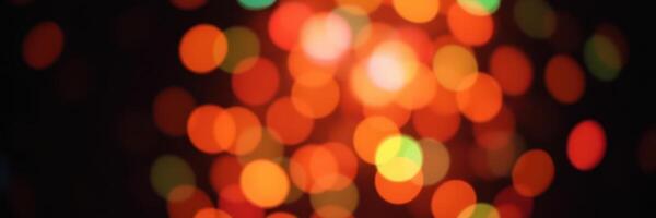 Colorful bokeh lights creating a festive atmosphere during evening celebrations photo