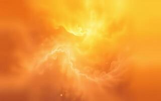 Vibrant orange clouds swirling with light during a dramatic sunset over a tranquil landscape photo