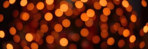 Warm, glowing orbs of light create a festive atmosphere during an evening celebration in autumn photo