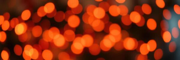 Warm orange lights create a festive atmosphere during a cozy evening gathering in a rustic setting photo