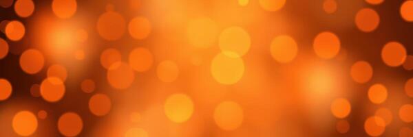 Warm orange bokeh lights create a vibrant atmosphere for a festive celebration or cozy gathering photo