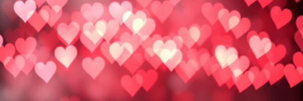 Vibrant heart shapes creating a romantic atmosphere in a blurred background during celebration or event photo