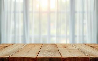 Wooden table with soft light filtering through sheer curtains in a cozy interior setting photo