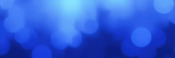 Soft blue bokeh background creates an ethereal atmosphere perfect for artistic designs and creative projects photo