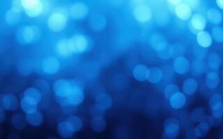 Colorful blue bokeh background with soft lights creating an abstract, dreamy atmosphere for design projects photo