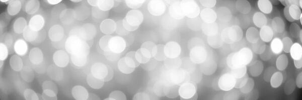 Soft bokeh background with sparkling light effects creating a dreamy atmosphere for artistic purposes photo