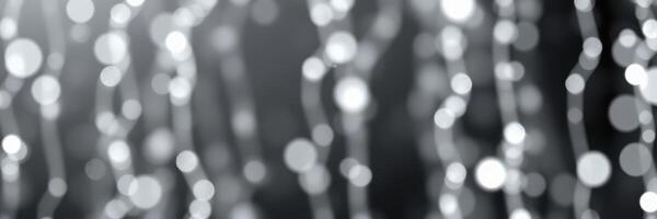 Stunning display of soft bokeh lights creating a magical atmosphere in a dimly lit setting photo