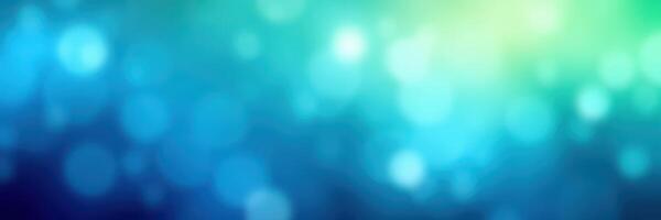 Abstract blue and green bokeh background with soft light effects for creative design projects photo