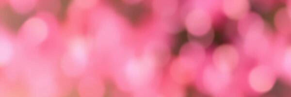 Soft pink bokeh lights create a dreamy atmosphere suitable for celebrations or romantic settings in an indoor space photo