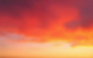 Vibrant sunset colors blend in the sky above a serene landscape during dusk photo