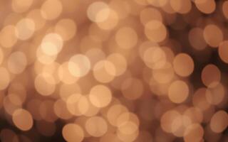 Soft golden lights create an enchanting bokeh effect in a cozy indoor setting during the evening photo