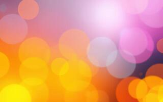 Vibrant bokeh background with orange, pink, and purple hues for creative design photo
