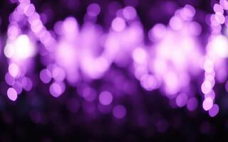 Colorful purple bokeh lights create an enchanting atmosphere at a lively nighttime event in a festive location photo