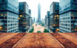 Urban skyline view from a wooden table overlooking a busy city street with modern buildings photo