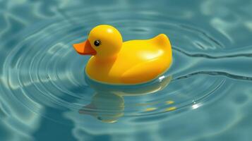 Yellow rubber duck floating on water creating gentle ripples in a tranquil setting photo