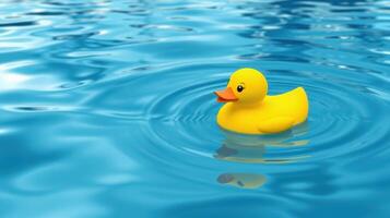 Cute yellow rubber duck floating on clear blue water in a serene setting photo