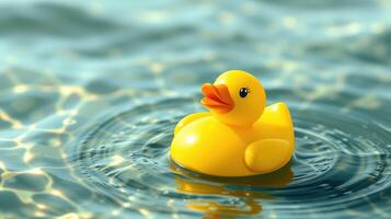Bright yellow rubber duck floating on tranquil water with ripples reflecting sunlight photo