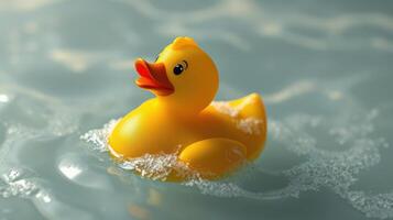 Bright yellow rubber duck floating in a calm water surface with gentle ripples in a tranquil setting photo