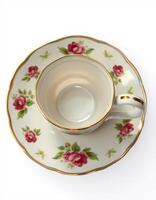 Decorative floral tea cup and saucer set designed with elegant gold rim details, perfect for afternoon tea and special occasions photo