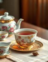 Exquisite tea ceremony with fine china in warm afternoon light at a cozy table setting photo