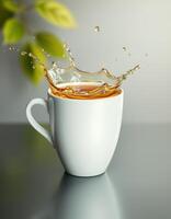 Coffee cup splashing liquid on a shiny surface with green leaves in the background during daylight photo
