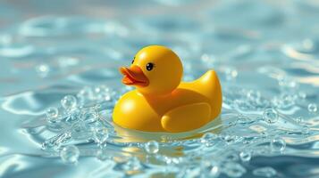 Bright yellow rubber duck floats on sparkling water in a tranquil setting during daylight hours photo