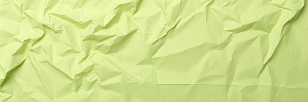 Crumpled light green paper texture used for creative and artistic projects or backgrounds in design work photo