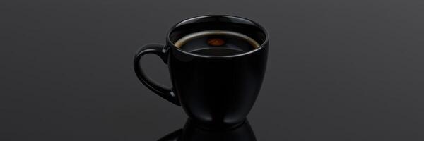 Black coffee cup resting on a dark surface reflecting subtle light during early morning hours photo