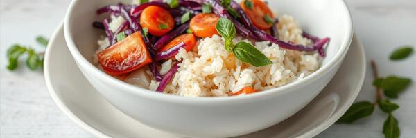 Colorful vegetable rice bowl topped with fresh herbs served in a simple dish photo