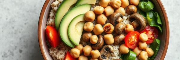 Healthy bowl with chickpeas, vegetables, and grains for a nutritious meal option photo