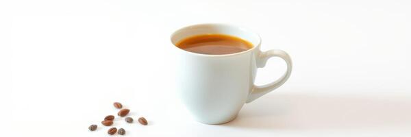 Hot coffee in a white mug with coffee beans on a clean surface photo