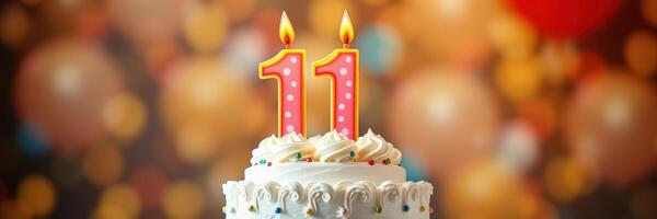Celebrating an 11th birthday with a colorful cake adorned with candles photo