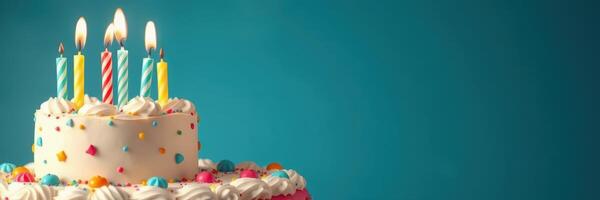 Colorful birthday cake with candles and decorations perfect for celebrations photo