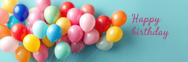 Colorful birthday balloons arranged against a blue background with cheerful greeting for a special celebration photo