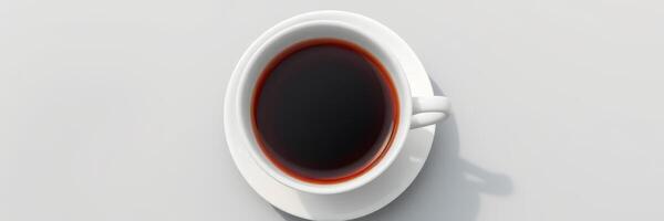 Freshly brewed coffee in a white cup on a table under natural light in a cozy cafe setting photo