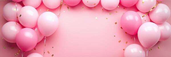 Decorated wall with pink balloons and gold confetti for a birthday celebration or party decoration photo