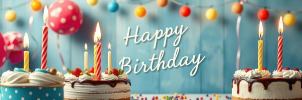 Colorful birthday celebration with cakes, candles, and decorations creating a festive atmosphere photo