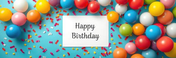 Colorful birthday celebration decor with balloons, confetti, and a cheerful message on a vibrant background photo