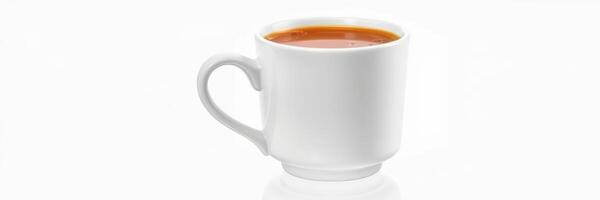 Warm cup of herbal tea placed on a reflective surface for a calming afternoon experience photo