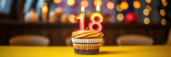 Celebration of turning eighteen with a cupcake featuring bright candles and festive decorations photo