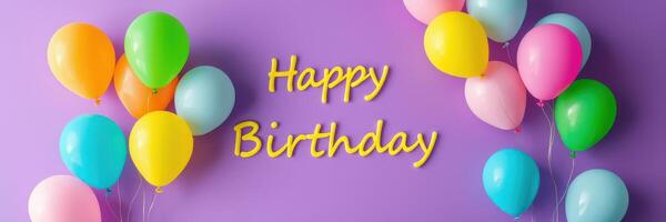 Colorful balloons and cheerful message welcome guests to a joyful birthday celebration in a vibrant setting photo
