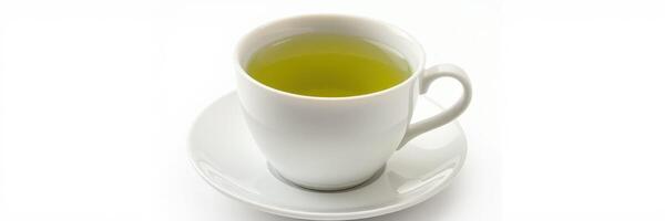 Green tea served in a white cup on a saucer, highlighting beverage presentation and warmth photo