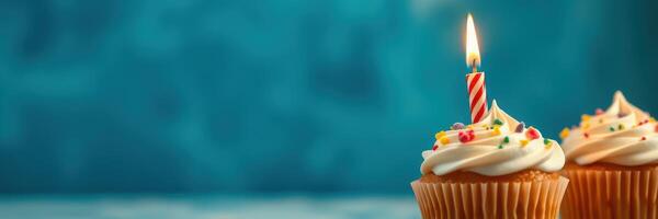 Colorful cupcakes with candles celebrate a special occasion in a festive setting photo