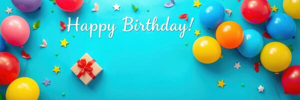 Festive birthday celebration with colorful balloons and a gift on a bright blue background photo