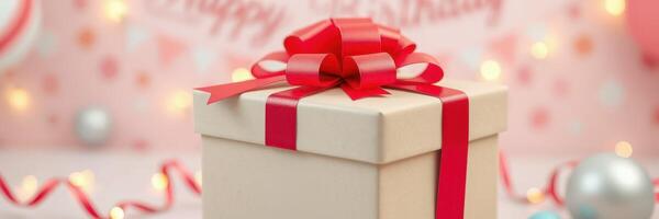 Colorful birthday gift with red ribbon and festive decorations in a cheerful setting photo
