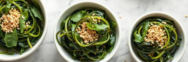 Fresh seaweed salad served in bowls with sesame seeds, perfect for a healthy meal or appetizer photo