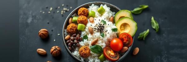 Healthy grain bowl with rice, vegetables, and nuts garnished with herbs and spices for a nutritious meal photo