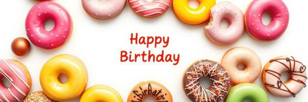 Colorful donuts arranged in a circle with a birthday greeting in the center for a festive celebration photo