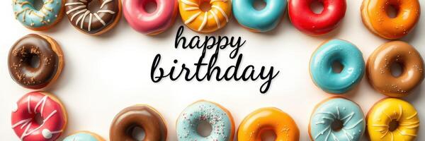 Colorful birthday donuts arranged in a festive display celebrating a special occasion with cheerful decorations and vibrant colors photo